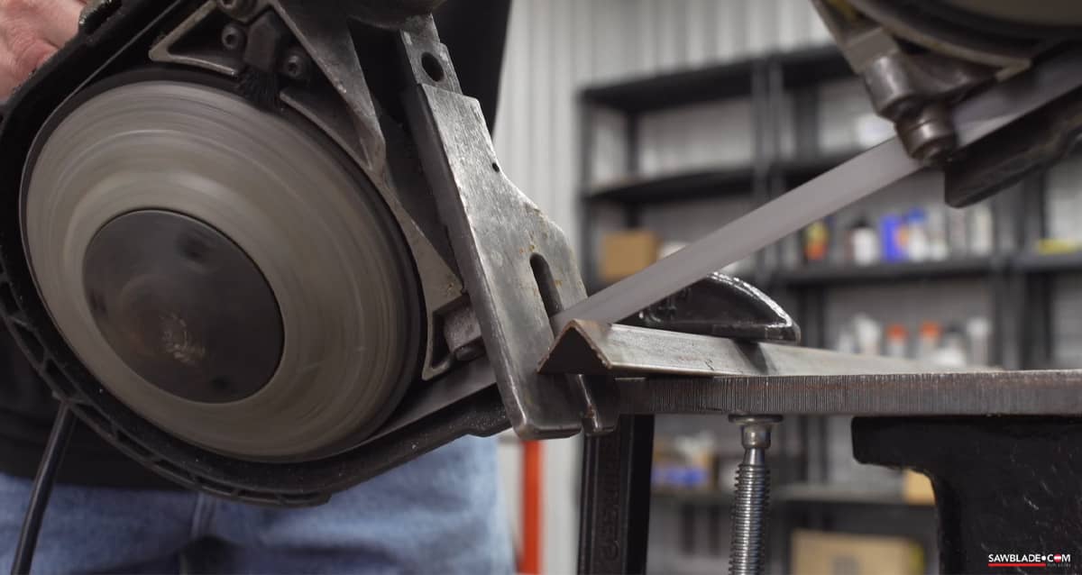 Portable bandsaw cutting close view